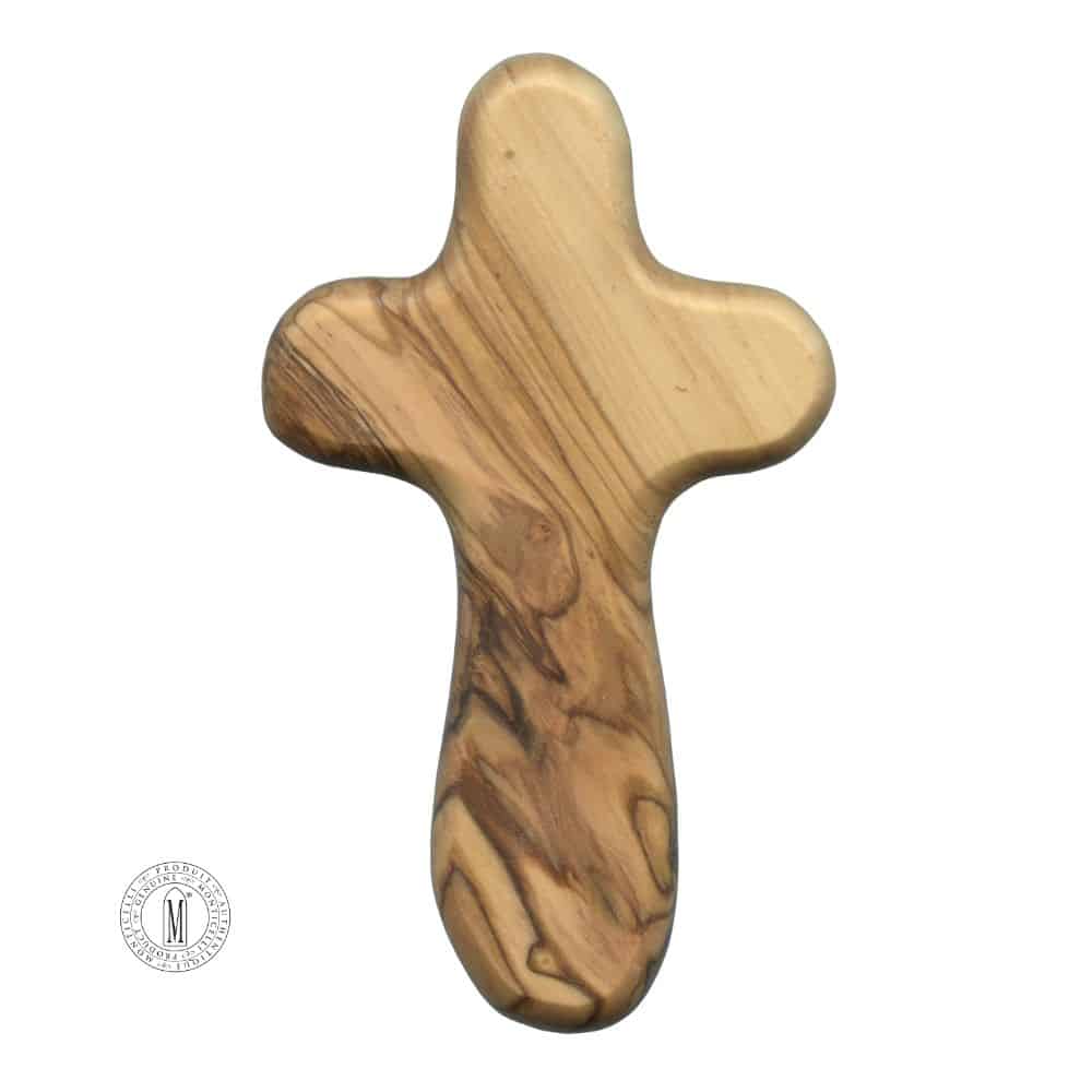Hand-carved olive wood comfort cross with natural grain patternCrafted from genuine olive wood from the Holy Land, this smooth, hand-carved wall cross features the natural grain and warm tones unique to each piece of olive tree. Its gentle curves and ergonomic shape make it ideal not only for wall display, but also for holding during moments of prayer, reflection, or healing.