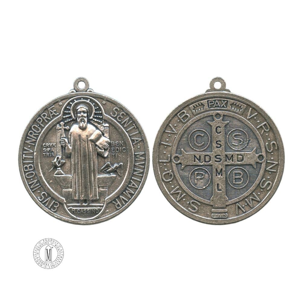 Double-sided Saint Benedict medal featuring Saint Benedict holding a cross on one side and the traditional Latin cross with inscriptions on the reverse, in antique silver finish.