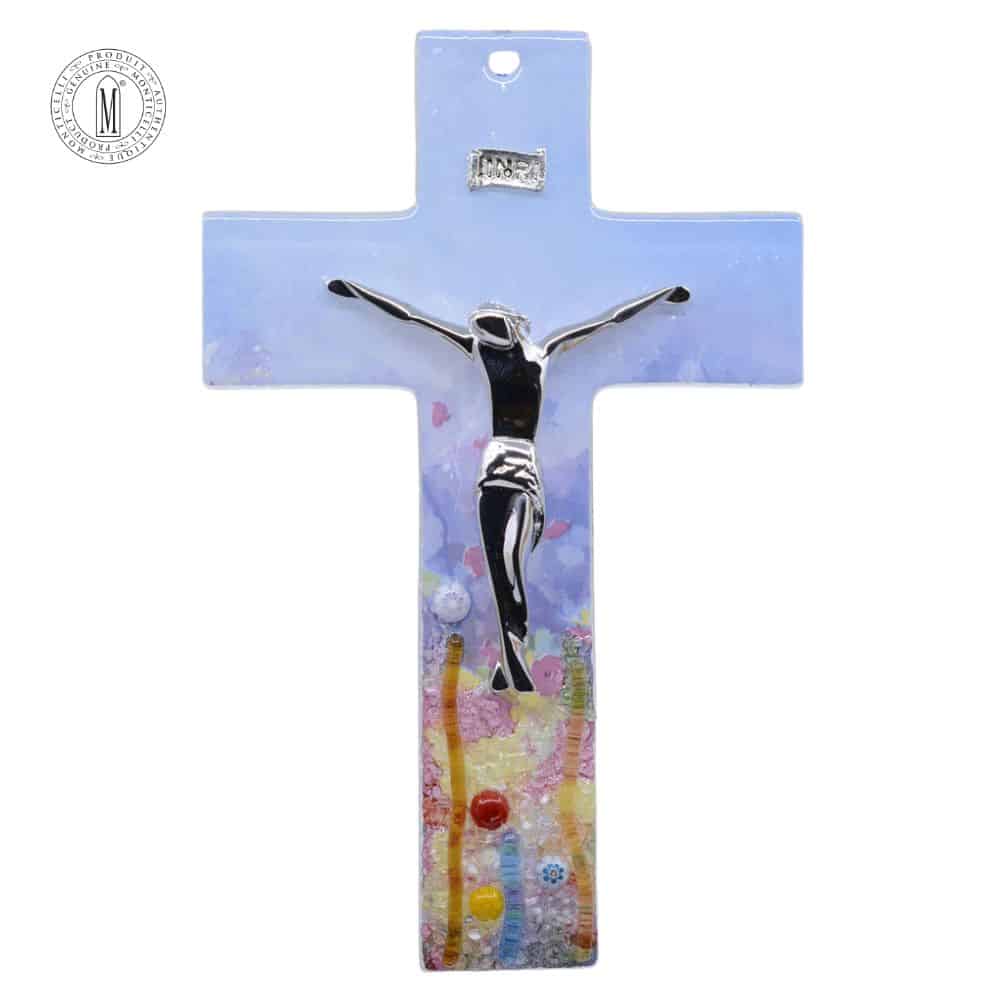 Murano-style glass crucifix with silver-tone corpus and a gradient blue top transitioning into a colorful yellow and red mosaic base