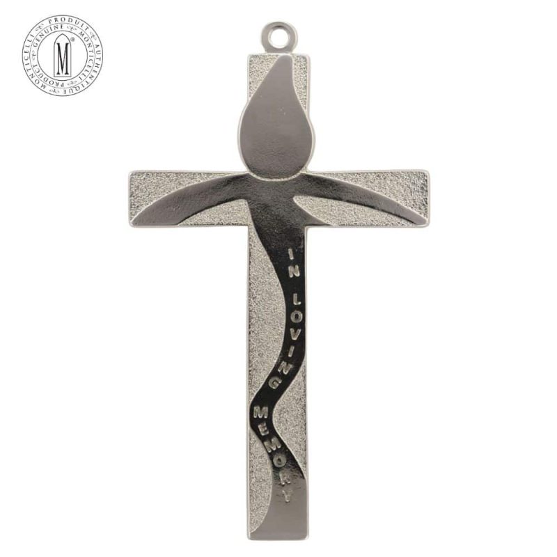 Back view of silver-tone memorial wall cross with flame shape and engraved “In Loving Memory”